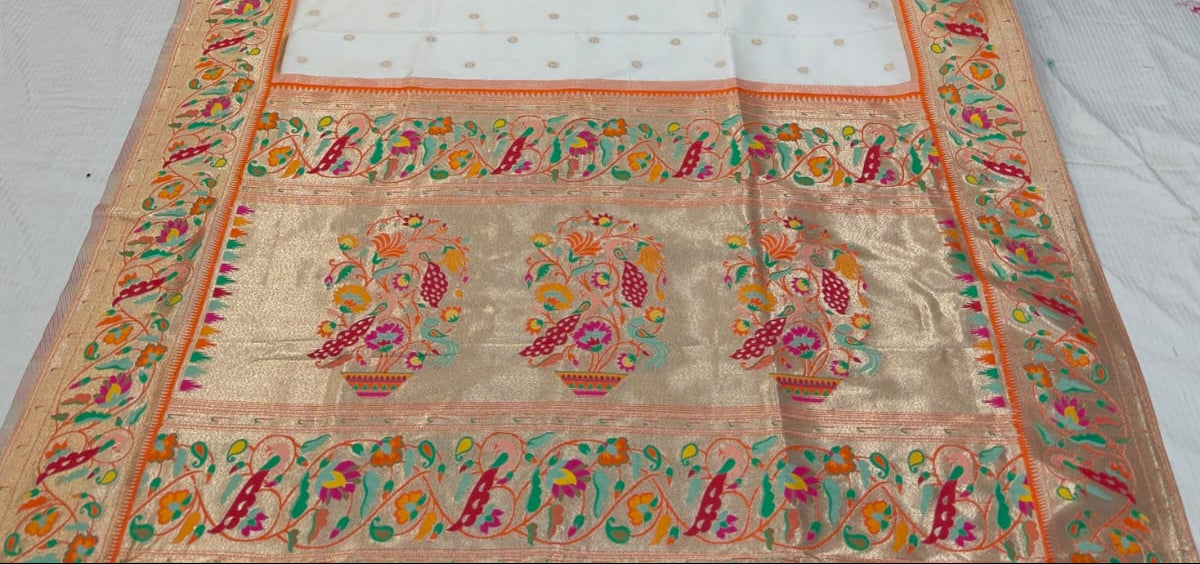 Decorative fabric with intricate patterns in a store setting