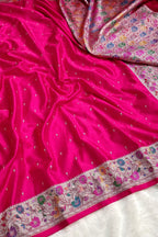 Pink saree with floral patterns and embroidery