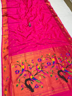 Saree with pink and orange design on a white background