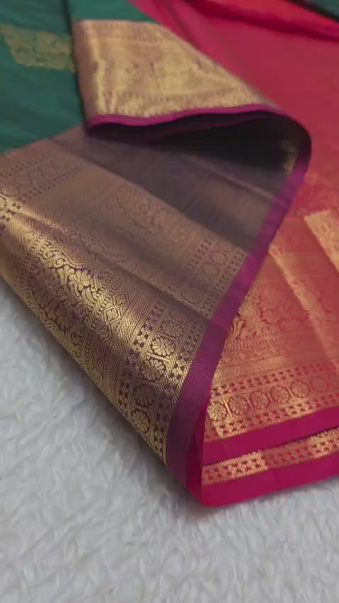 green n red border saree