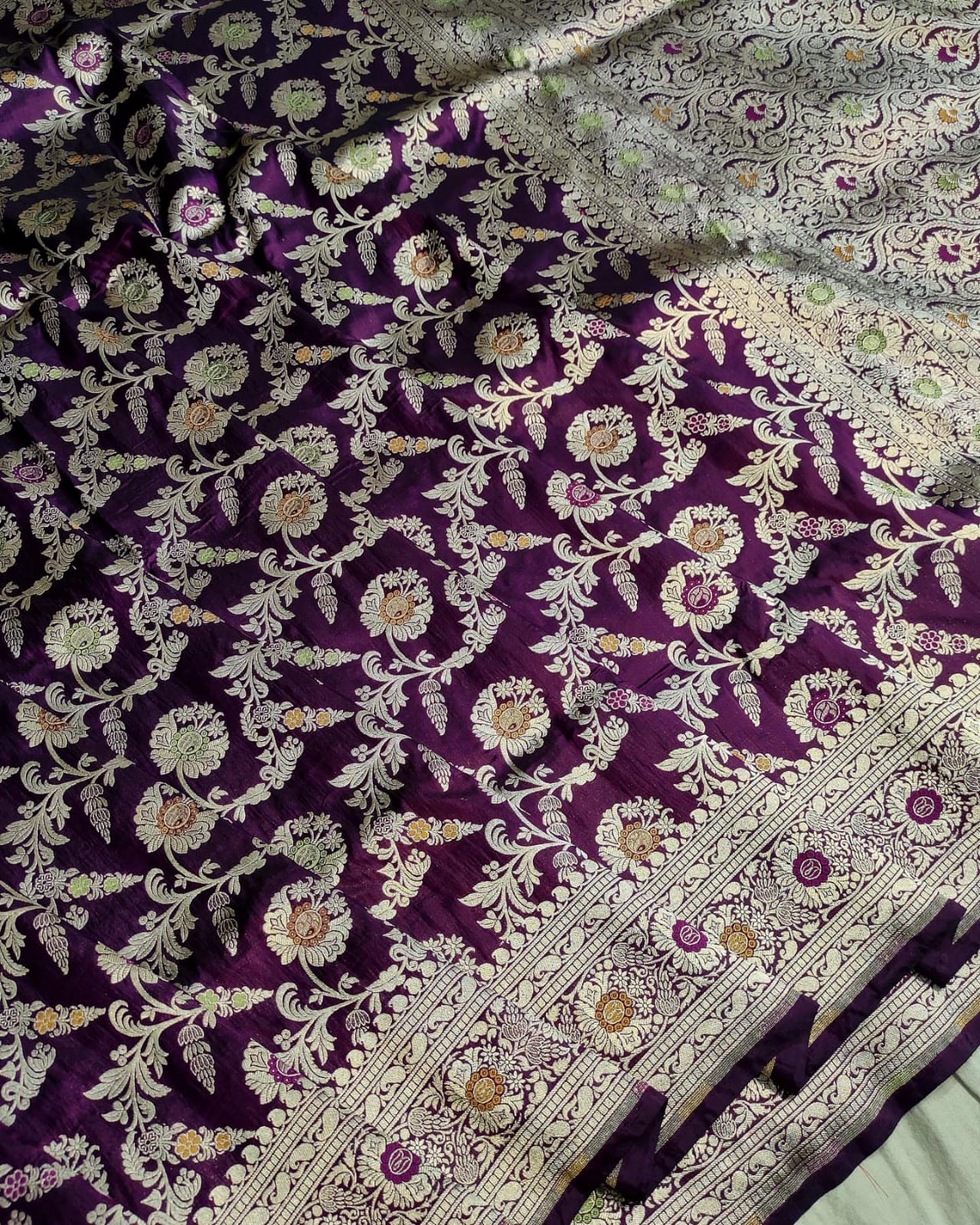 Floral patterned fabric with purple and white colors