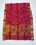 Red and gold saree with decorative patterns on a white background