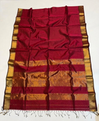 Red and gold striped fabric with a white background