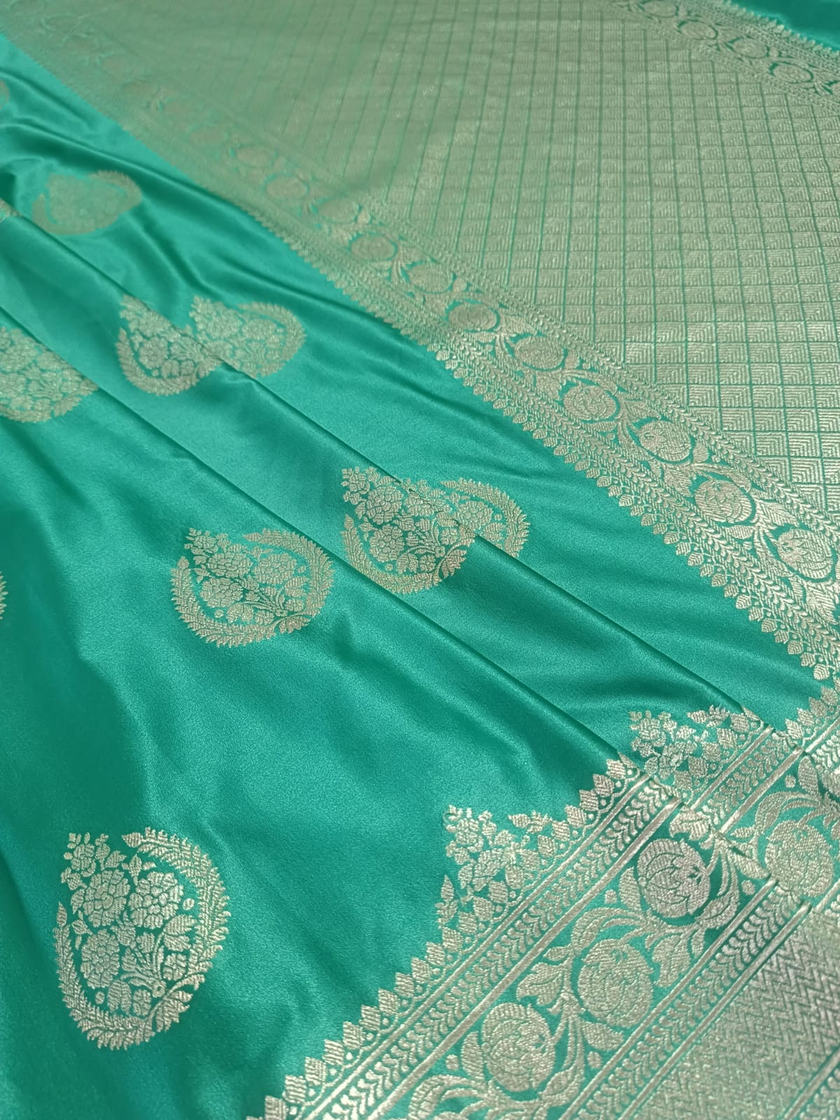 Teal saree with gold embroidery