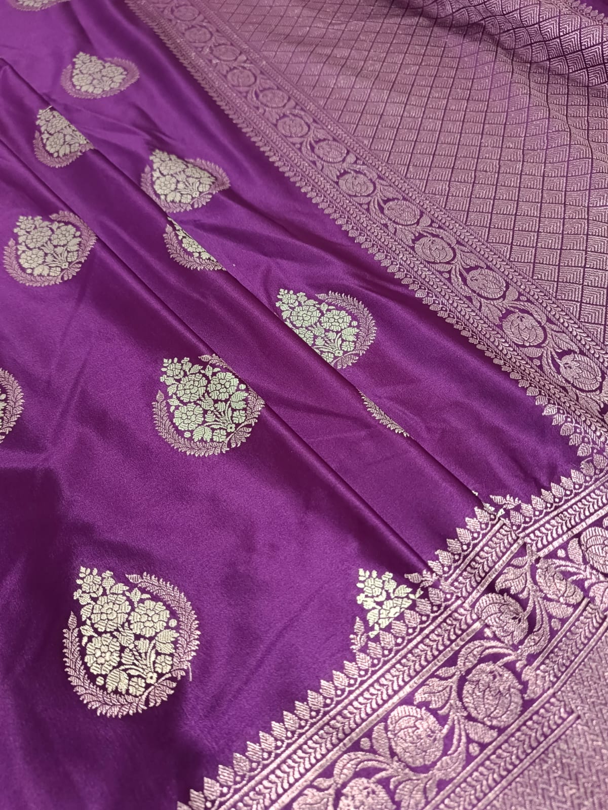 Purple saree with silver floral patterns