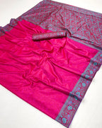 Pink saree with blue floral patterns on a white background