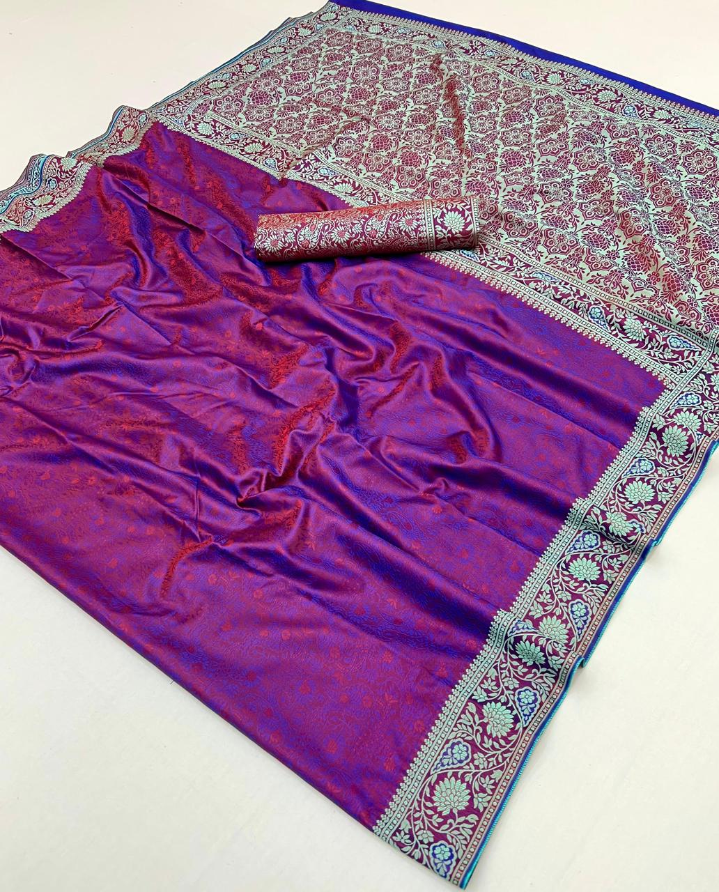 Purple fabric with intricate patterns on a white background