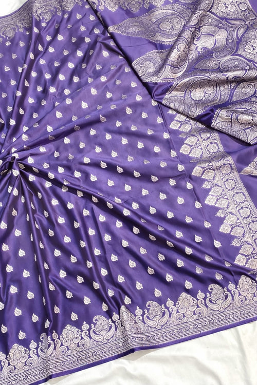 Purple fabric with white patterns on a white background